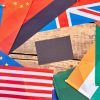 Flags gathering on wood with copyspace. servicio de traducción en Barcelona